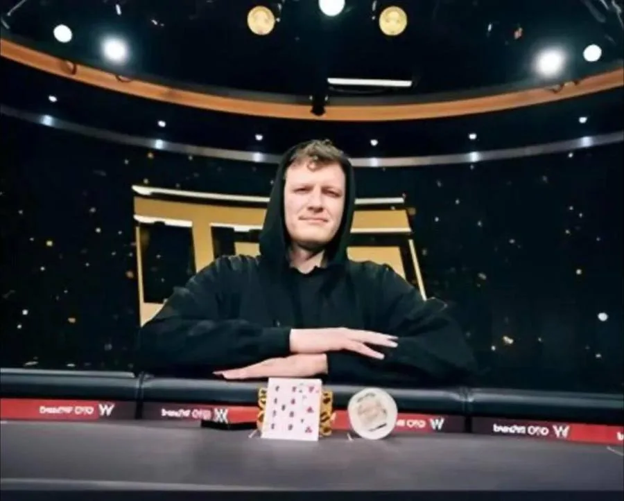 A Thomas Boivin student at the US Poker Open winner's table with the trophy