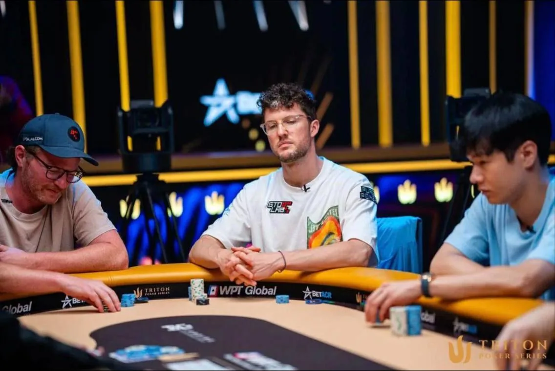 Thomas Boivin at a Triton Poker table with other players